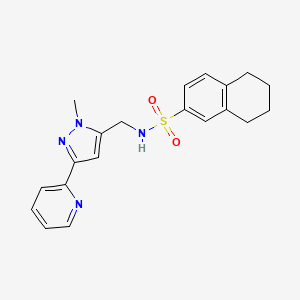 molecular formula C20H22N4O2S B2709442 N-[(2-Methyl-5-pyridin-2-ylpyrazol-3-yl)methyl]-5,6,7,8-tetrahydronaphthalene-2-sulfonamide CAS No. 2309311-19-9
