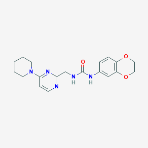 molecular formula C19H23N5O3 B2709652 1-(2,3-Dihydrobenzo[b][1,4]dioxin-6-yl)-3-((4-(piperidin-1-yl)pyrimidin-2-yl)methyl)urea CAS No. 1797804-80-8