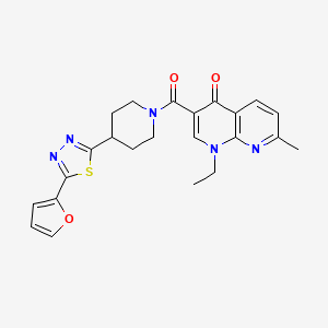 molecular formula C23H23N5O3S B2709799 1-乙基-3-(4-(5-(呋喃-2-基)-1,3,4-噻二唑-2-基)哌啶-1-甲酰)-7-甲基-1,8-萘啶-4(1H)-酮 CAS No. 1351655-50-9