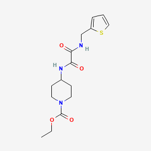 molecular formula C15H21N3O4S B2710168 Ethyl 4-(2-oxo-2-((thiophen-2-ylmethyl)amino)acetamido)piperidine-1-carboxylate CAS No. 1206991-53-8
