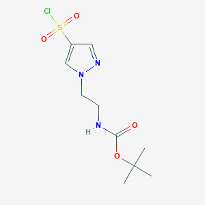 molecular formula C10H16ClN3O4S B2710604 Tert-butyl N-[2-(4-chlorosulfonylpyrazol-1-yl)ethyl]carbamate CAS No. 2375273-43-9