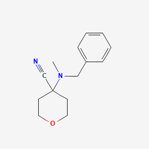 4-[Benzyl(methyl)amino]oxane-4-carbonitrile