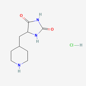 molecular formula C9H16ClN3O2 B2711664 5-[(Piperidin-4-yl)methyl]imidazolidine-2,4-dione hydrochloride CAS No. 2319060-18-7