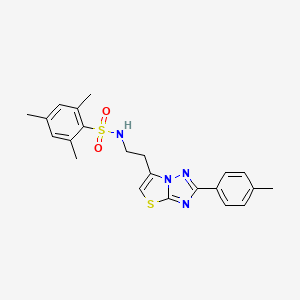 molecular formula C22H24N4O2S2 B2712103 2,4,6-trimethyl-N-(2-(2-(p-tolyl)thiazolo[3,2-b][1,2,4]triazol-6-yl)ethyl)benzenesulfonamide CAS No. 877642-44-9