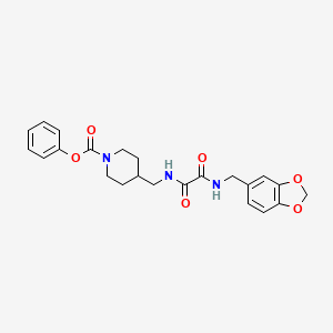 molecular formula C23H25N3O6 B2714196 苯基-4-((2-((苯并[d][1,3]二噁杂环-5-基甲基)氨基)-2-酮基乙酰胺基)甲基)哌啶-1-甲酸酯 CAS No. 1235082-48-0