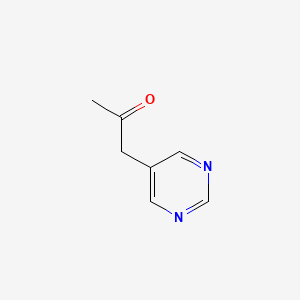 1-(Pyrimidin-5-yl)propan-2-one