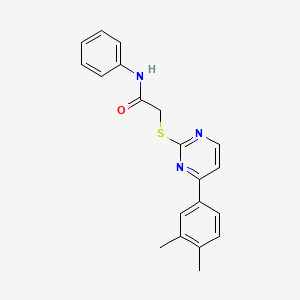 molecular formula C20H19N3OS B2714442 2-{[4-(3,4-dimethylphenyl)pyrimidin-2-yl]sulfanyl}-N-phenylacetamide CAS No. 1019153-39-9