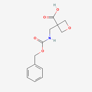 molecular formula C13H15NO5 B2714655 3-((((Benzyloxy)carbonyl)amino)methyl)oxetane-3-carboxylic acid CAS No. 2138200-00-5