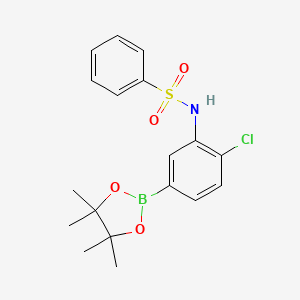 molecular formula C18H21BClNO4S B2715449 N-(2-氯-5-(4,4,5,5-四甲基-1,3,2-二氧杂硼杂环戊二烷-2-基)苯基)苯磺酰胺 CAS No. 1106313-60-3