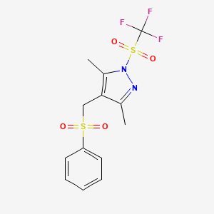 molecular formula C13H13F3N2O4S2 B2716455 3,5-二甲基-4-[(苯基磺酰基)甲基]-1-[(三氟甲基)磺酰基]-1H-嘧啶 CAS No. 324009-26-9