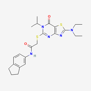 molecular formula C23H29N5O2S2 B2716654 2-{[2-(diethylamino)-6-isopropyl-7-oxo-6,7-dihydro[1,3]thiazolo[4,5-d]pyrimidin-5-yl]sulfanyl}-N~1~-(2,3-dihydro-1H-inden-5-yl)acetamide CAS No. 1207038-52-5