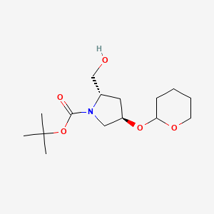 tert-butyl (2S,4R)-2-(hydroxymethyl)-4-(oxan-2-yloxy)pyrrolidine-1-carboxylate