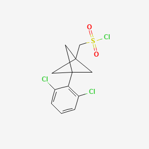 molecular formula C12H11Cl3O2S B2718344 [3-(2,6-Dichlorophenyl)-1-bicyclo[1.1.1]pentanyl]methanesulfonyl chloride CAS No. 2287301-09-9