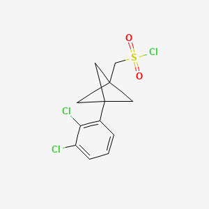 molecular formula C12H11Cl3O2S B2718375 [3-(2,3-Dichlorophenyl)-1-bicyclo[1.1.1]pentanyl]methanesulfonyl chloride CAS No. 2287273-96-3