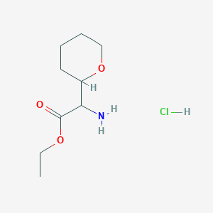 Ethyl2-amino-2-(oxan-2-yl)acetatehydrochloride