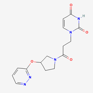 molecular formula C15H17N5O4 B2721183 1-(3-oxo-3-(3-(pyridazin-3-yloxy)pyrrolidin-1-yl)propyl)pyrimidine-2,4(1H,3H)-dione CAS No. 2034500-59-7