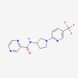 molecular formula C15H14F3N5O B2721262 N-(1-(5-(三氟甲基)吡啶-2-基)吡咯烷-3-基)吡嘧啶-2-羧酰胺 CAS No. 2034377-63-2