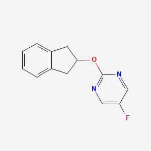 molecular formula C13H11FN2O B2721779 2-(2,3-二氢-1H-茚-2-基氧基)-5-氟吡嘧啶 CAS No. 2194848-52-5