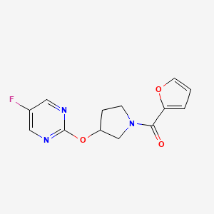 molecular formula C13H12FN3O3 B2721974 (3-((5-Fluoropyrimidin-2-yl)oxy)pyrrolidin-1-yl)(furan-2-yl)methanone CAS No. 2034360-07-9