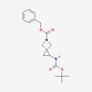 molecular formula C18H24N2O4 B2724117 Benzyl 1-{[(tert-butoxy)carbonyl]amino}-5-azaspiro[2.3]hexane-5-carboxylate CAS No. 1934773-84-8