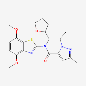 N-(4,7-dimethoxy-1,3-benzothiazol-2-yl)-1-ethyl-3-methyl-N-[(oxolan-2-yl)methyl]-1H-pyrazole-5-carboxamide