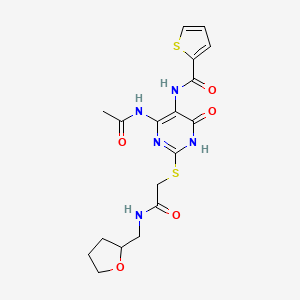 N-(4-acetamido-6-oxo-2-((2-oxo-2-(((tetrahydrofuran-2-yl)methyl)amino)ethyl)thio)-1,6-dihydropyrimidin-5-yl)thiophene-2-carboxamide