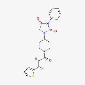 (E)-3-phenyl-1-(1-(3-(thiophen-2-yl)acryloyl)piperidin-4-yl)imidazolidine-2,4-dione