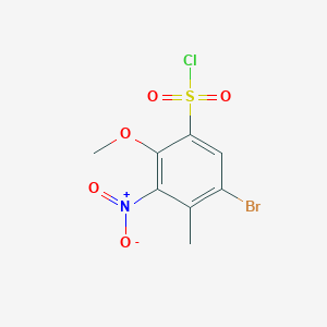 molecular formula C8H7BrClNO5S B2726169 5-Bromo-2-methoxy-4-methyl-3-nitrobenzene-1-sulfonyl chloride CAS No. 1803570-11-7