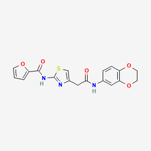 molecular formula C18H15N3O5S B2727054 N-(4-{[(2,3-dihydro-1,4-benzodioxin-6-yl)carbamoyl]methyl}-1,3-thiazol-2-yl)furan-2-carboxamide CAS No. 921820-16-8