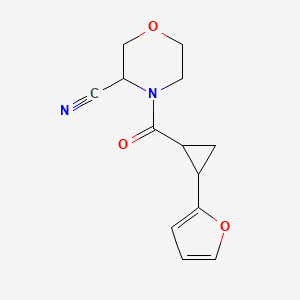 molecular formula C13H14N2O3 B2727779 4-[2-(Furan-2-yl)cyclopropanecarbonyl]morpholine-3-carbonitrile CAS No. 1394712-65-2
