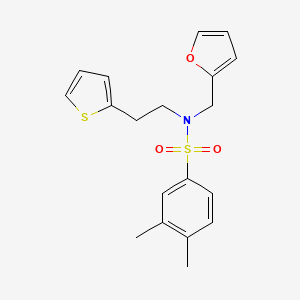 molecular formula C19H21NO3S2 B2727791 N-(furan-2-ylmethyl)-3,4-dimethyl-N-(2-(thiophen-2-yl)ethyl)benzenesulfonamide CAS No. 1396673-91-8
