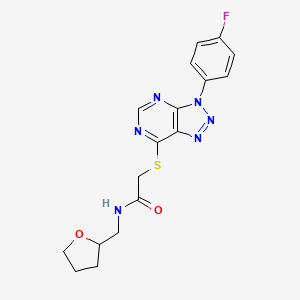 2-[3-(4-fluorophenyl)triazolo[4,5-d]pyrimidin-7-yl]sulfanyl-N-(oxolan-2-ylmethyl)acetamide