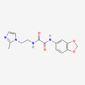 molecular formula C15H16N4O4 B2729663 N1-(benzo[d][1,3]dioxol-5-yl)-N2-(2-(2-methyl-1H-imidazol-1-yl)ethyl)oxalamide CAS No. 1209858-09-2