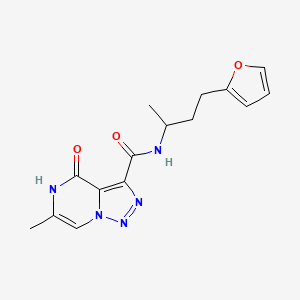 molecular formula C15H17N5O3 B2730460 N-[3-(2-furyl)-1-methylpropyl]-6-methyl-4-oxo-4,5-dihydro[1,2,3]triazolo[1,5-a]pyrazine-3-carboxamide CAS No. 1396677-69-2