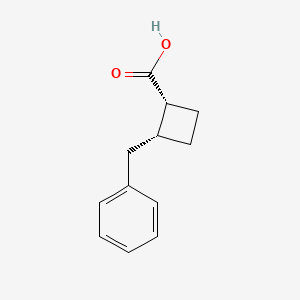 molecular formula C12H14O2 B2730494 (1R,2R)-2-苄基环丁烷-1-羧酸 CAS No. 1932270-57-9