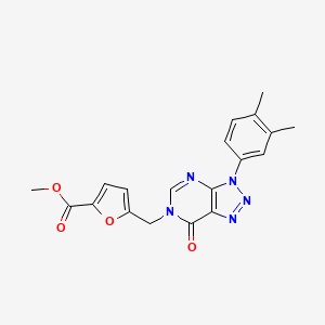 molecular formula C19H17N5O4 B2731225 methyl 5-{[3-(3,4-dimethylphenyl)-7-oxo-3H,6H,7H-[1,2,3]triazolo[4,5-d]pyrimidin-6-yl]methyl}furan-2-carboxylate CAS No. 893918-97-3