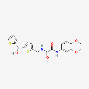 molecular formula C20H18N2O5S2 B2732364 N1-(2,3-dihydrobenzo[b][1,4]dioxin-6-yl)-N2-((5-(hydroxy(thiophen-2-yl)methyl)thiophen-2-yl)methyl)oxalamide CAS No. 1421498-24-9