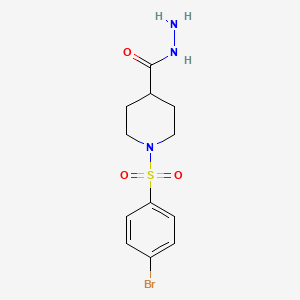 molecular formula C12H16BrN3O3S B2735033 1-[(4-Bromophenyl)sulfonyl]piperidine-4-carbohydrazide CAS No. 590376-86-6