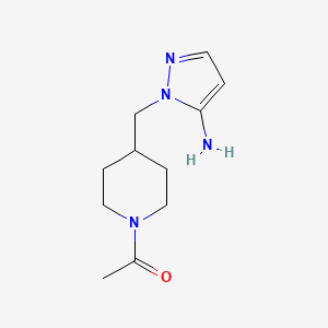 molecular formula C11H18N4O B2735575 1-4-[(5-Amino-1H-pyrazol-1-yl)methyl]piperidin-1-ylethan-1-one CAS No. 1448855-42-2