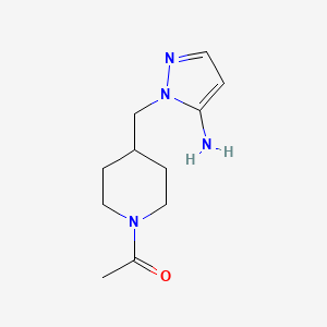 molecular formula C11H18N4O B2735575 1-(4-((5-Amino-1H-pyrazol-1-yl)methyl)piperidin-1-yl)ethanone CAS No. 1448855-42-2