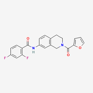 molecular formula C21H16F2N2O3 B2736060 2,4-difluoro-N-(2-(furan-2-carbonyl)-1,2,3,4-tetrahydroisoquinolin-7-yl)benzamide CAS No. 955686-01-8