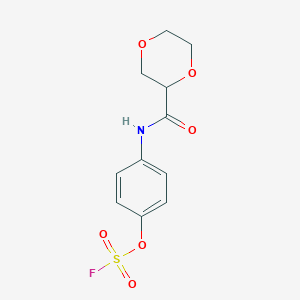 molecular formula C11H12FNO6S B2736868 2-[(4-Fluorosulfonyloxyphenyl)carbamoyl]-1,4-dioxane CAS No. 2411310-55-7