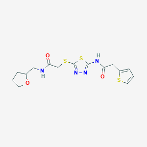 molecular formula C15H18N4O3S3 B2737611 N-(5-((2-oxo-2-(((tetrahydrofuran-2-yl)methyl)amino)ethyl)thio)-1,3,4-thiadiazol-2-yl)-2-(thiophen-2-yl)acetamide CAS No. 868977-19-9