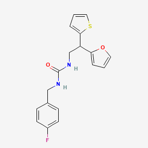 1-[(4-Fluorophenyl)methyl]-3-[2-(furan-2-yl)-2-(thiophen-2-yl)ethyl]urea