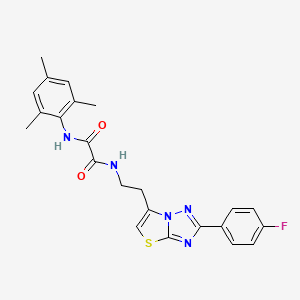 molecular formula C23H22FN5O2S B2738264 N1-(2-(2-(4-fluorophenyl)thiazolo[3,2-b][1,2,4]triazol-6-yl)ethyl)-N2-mesityloxalamide CAS No. 894034-57-2