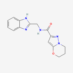 molecular formula C15H15N5O2 B2739263 N-((1H-benzo[d]imidazol-2-yl)methyl)-6,7-dihydro-5H-pyrazolo[5,1-b][1,3]oxazine-2-carboxamide CAS No. 1448043-32-0