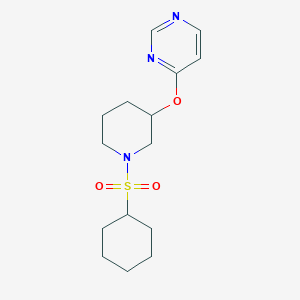 molecular formula C15H23N3O3S B2740771 4-((1-(环己磺酰)哌啶-3-基氧基)嘧啶) CAS No. 2034524-53-1