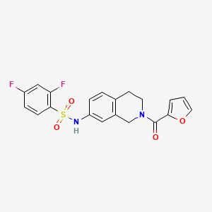 molecular formula C20H16F2N2O4S B2741729 2,4-二氟-N-(2-(呋喃-2-甲酰)-1,2,3,4-四氢异喹啉-7-基)苯甲磺酰胺 CAS No. 955649-92-0