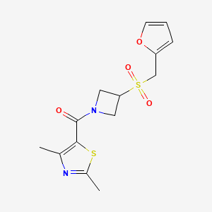 molecular formula C14H16N2O4S2 B2742132 (2,4-Dimethylthiazol-5-yl)(3-((furan-2-ylmethyl)sulfonyl)azetidin-1-yl)methanone CAS No. 1797020-63-3