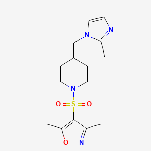 molecular formula C15H22N4O3S B2742843 3,5-二甲基-4-((4-((2-甲基-1H-咪唑-1-基)甲基哌啶-1-基)磺酰)噁唑-5-基) CAS No. 1396803-03-4
